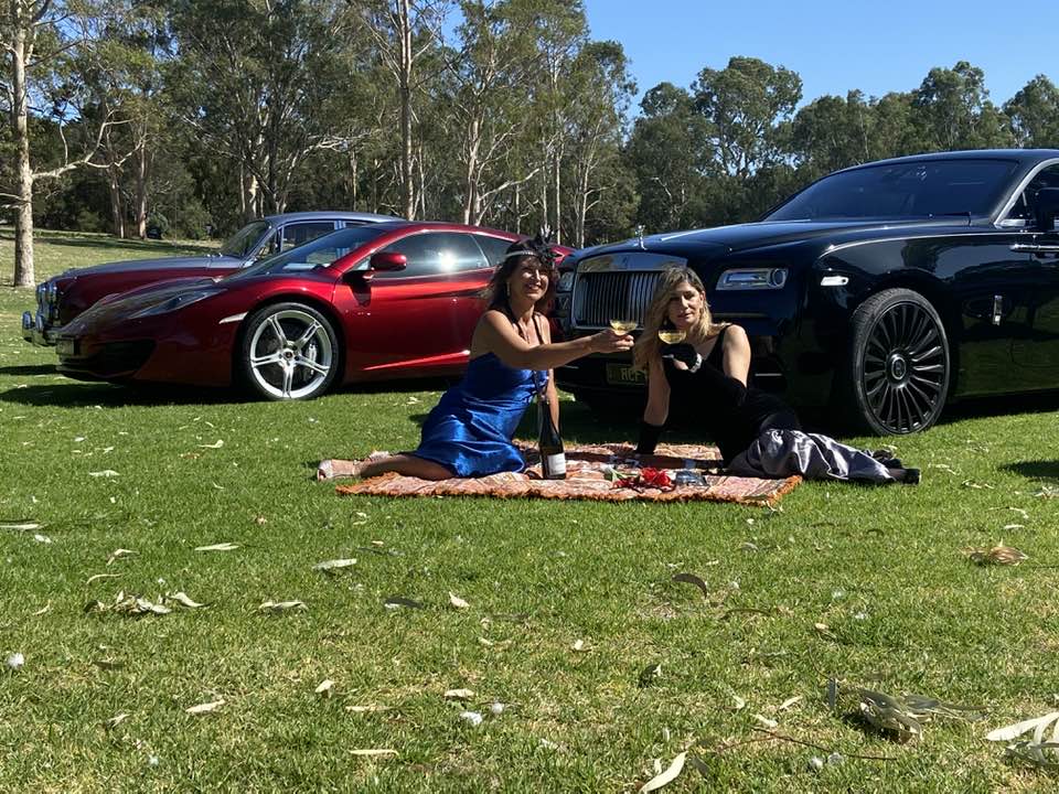 Ladies enjoying a glass of bubbles at the annual Vintage and Classic Wine Festival